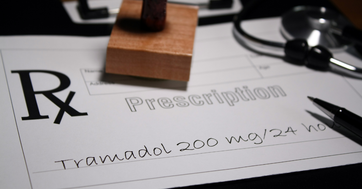 an image of a prescription for tramadol on a black background.